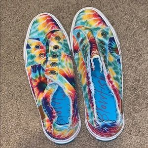 Lightly worn blow fish slip on sneakers.